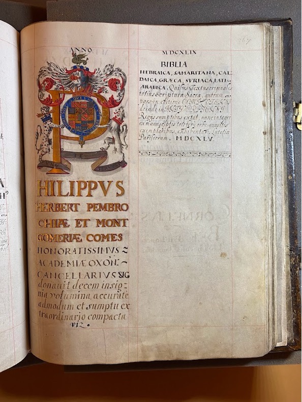 Image of a page from the register showing the entry of donations made by Philip Herbert. His name and titles are written in gold ink, and the initial P richly illuminated with heraldry. The titles of books follow in Latin.